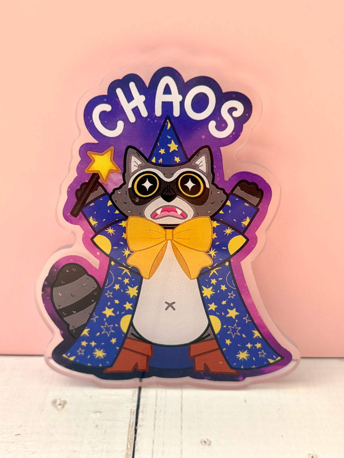 Large Chaos Raccoon Acrylic Pin - finished coloured version featuring a wizard raccoon in a starry blue cape