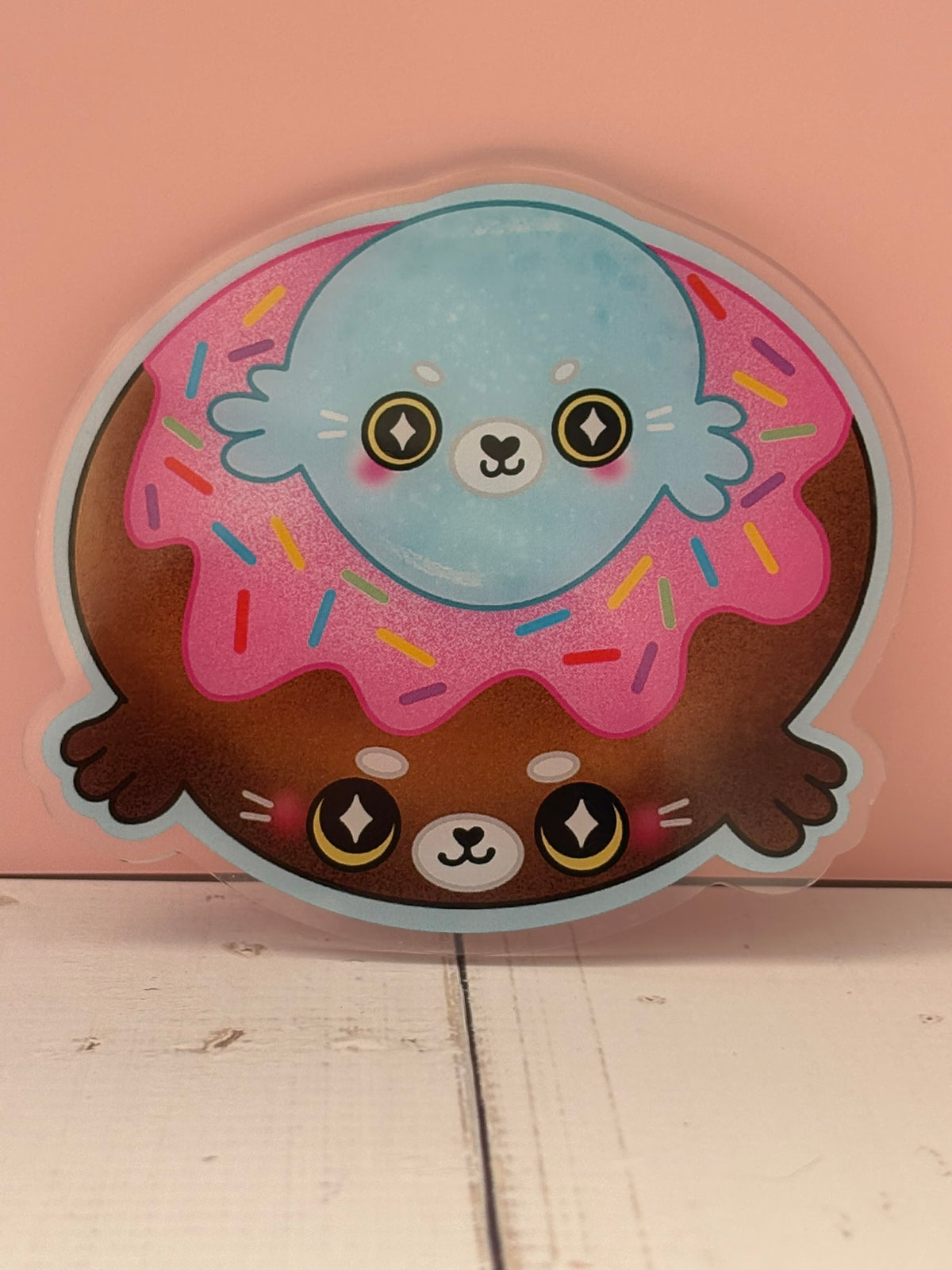 Large Doughnut Seals Pin - finished version featuring two blue seals in a pink frosted doughnut with rainbow sprinkles