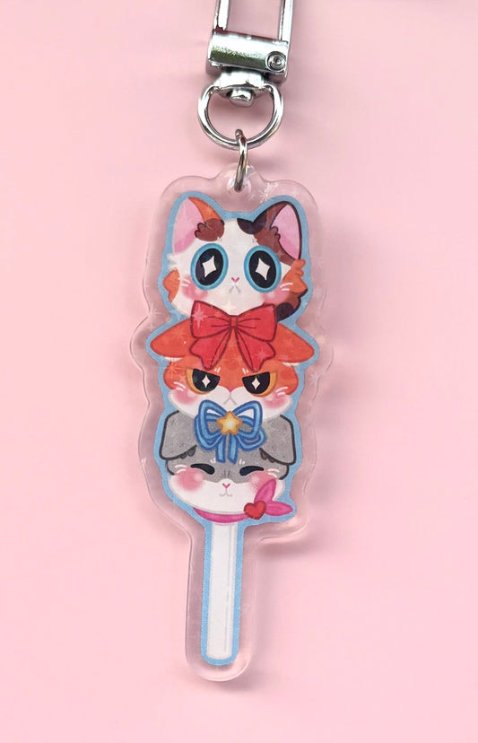 Lollipop Cat Holographic Keyring - four stacked cats with bows on a lollipop stick acrylic charm