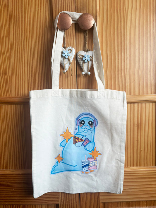 Cream Snack Seal tote bag with long handles and a blue seal wearing headphones